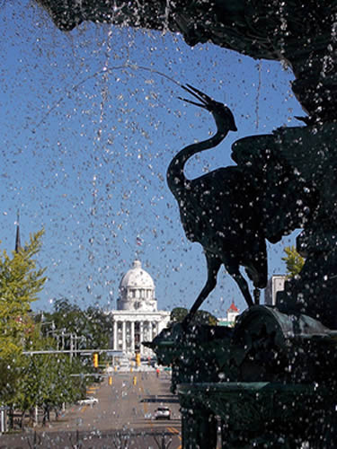 Alabama capitol seen through fountain