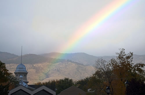 Mountains, cupola, and rainbow